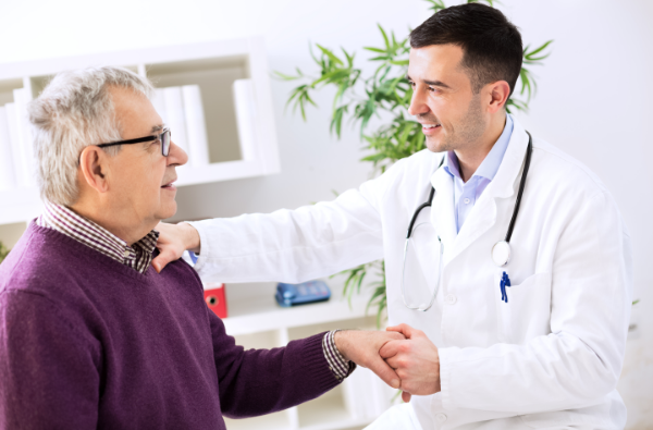 A patient in a doctor's clinic with an indoor plant