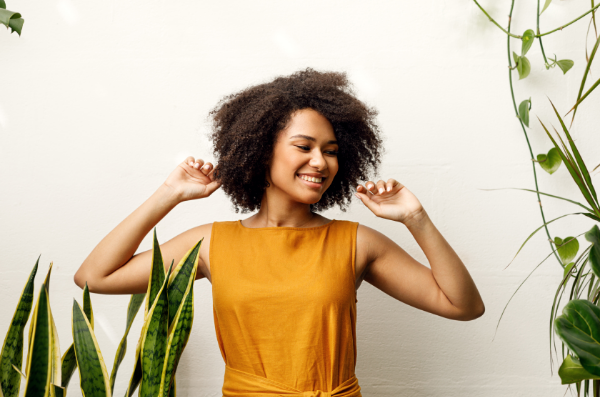 Woman enjoying house plants