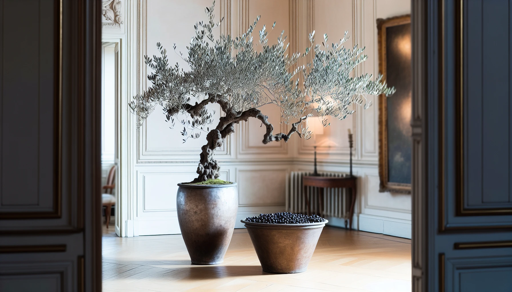 An elegant indoor setting with an olive tree as a centerpiece